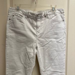 White blinged out jeans with studs. Dbl back belt loop. Blinged out pocket studs